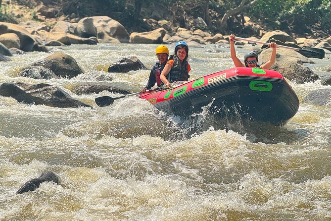 7 Hour Sticky Waterfall and Double Rafting Adventure - Bamboo rafting through peaceful jungle scenery