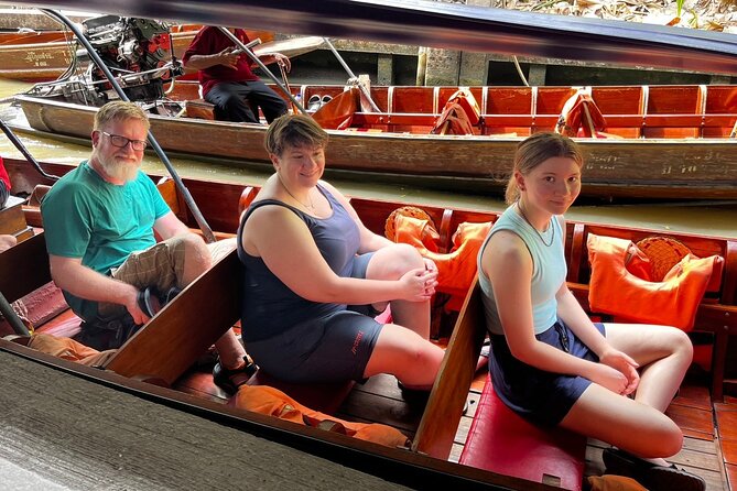 Amphawa and Railway Markets with Boat Ride Group Tour - Amphawa Floating Market after sunset