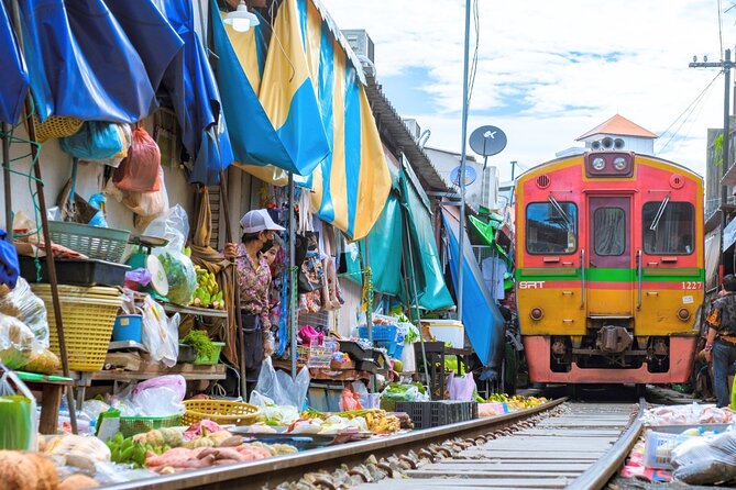 Amphawa Floating Market & Maeklong Railway Train Market Tour - Wat Bang Kung and the banyan-tree shrine