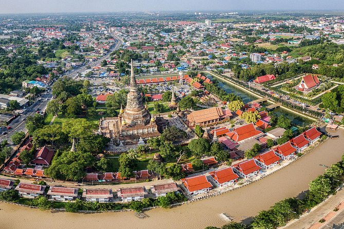 Ancient Wonders of Ayutthaya with Return Scenic River Cruise - Arriving in Ayutthaya and seeing four major sites