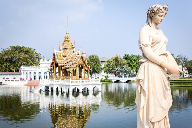 Ayutthaya Sunset Tour: Iconic Temples & Scenic River Boat Ride - The traditional boat ride and sunset views