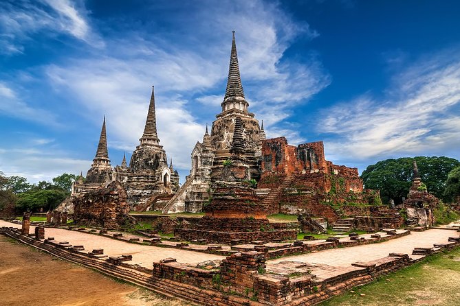 Ayutthaya Temples Tour from Bangkok with Grand Pearl River Cruise - Wihan Phra Mongkhon Bophit and a living place of worship
