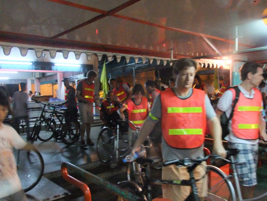 Bangkok by Night Cycling Tour with Street-food Meal - The guides and the feel of the ride