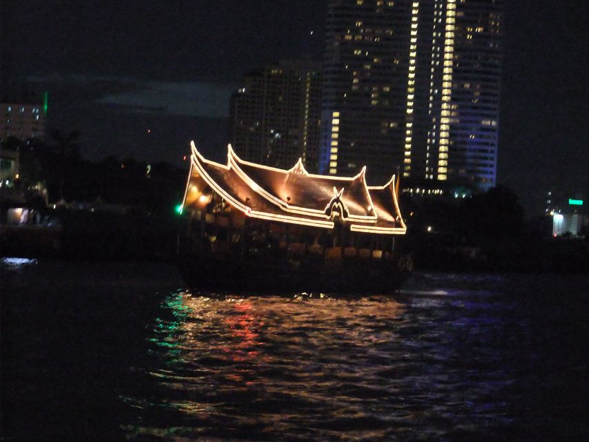 Bangkok by Night Cycling Tour with Street-food Meal - Crossing into Thonburi’s local neighborhoods