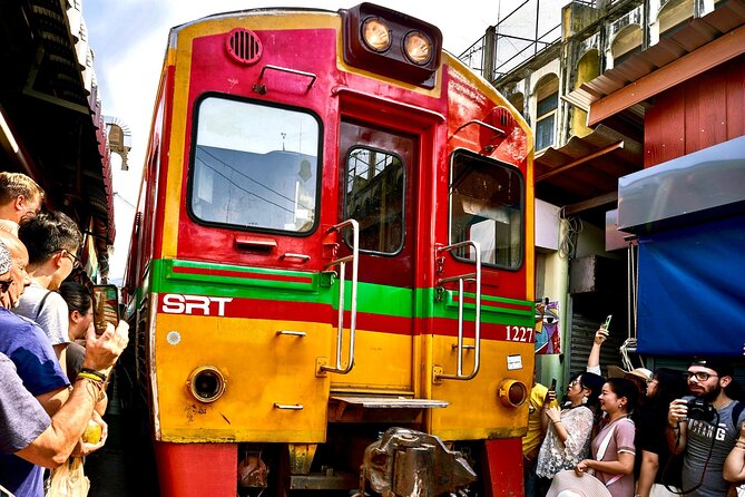 Bangkok: Floating Market and Train Market Experience - Watching the train fold Maeklong Market away