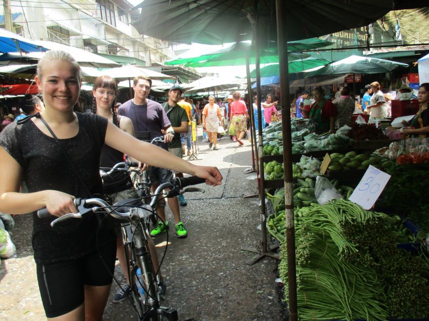 Bangkok Full-Day Bike Tour with Boat Transfer and Lunch - Bangkok’s Market: A Noisy Introduction to Everyday Life
