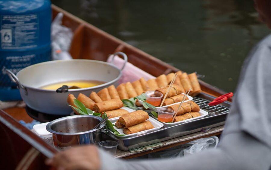 Bangkok: Maeklong Railway Market and Amphawa Floating Market - Watching Maeklong Market make room for a train