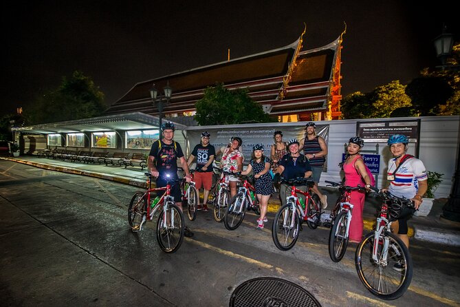 Bangkok: Night Bike Tour with Temples & Flower Market Visit - Rama VIII Bridge brings the first big view