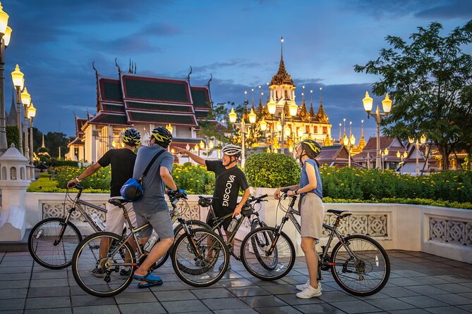 Bangkok: Night Bike Tour with Temples & Flower Market Visit - The Chao Phraya ferry is the evening’s signature moment