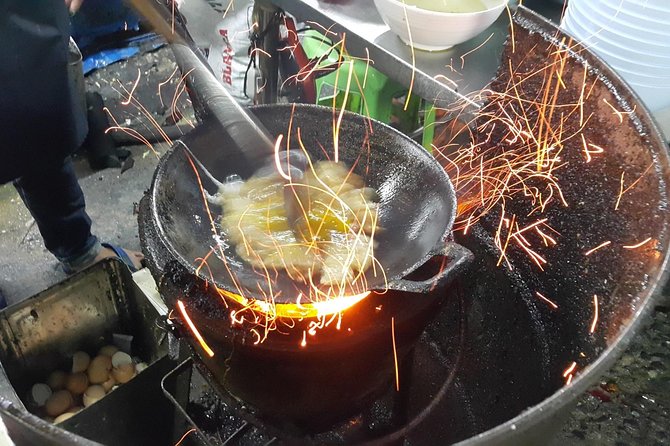 Bangkok Night Food and City Tour by Tuk Tuk - Temple sights, quiet shrines, and the Giant Swing