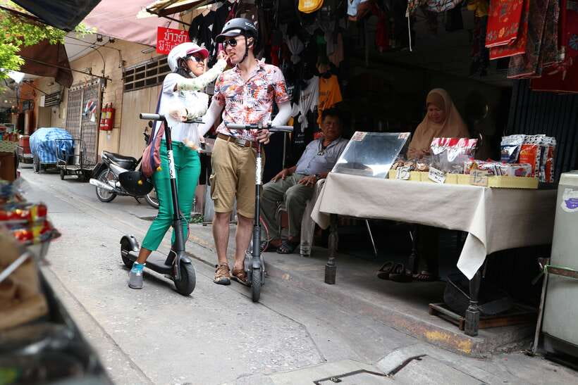 Bangkok: Riverside E-Scooter Adventure with StreetFood Snack - Fruit, markets, and everyday Bangkok