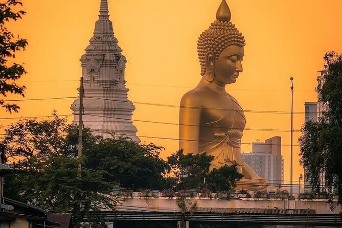 Bangkok : Sunset Food tour by Tuk Tuk boat with big Buddha view - Sunset views of Wat Arun, the Grand Palace, and Wat Pho