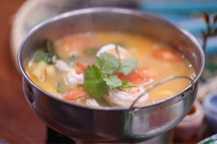 Bangkok: White Lotus Thai Cooking Class with Market Tour - Fresh coconut milk and the pleasure of doing the work