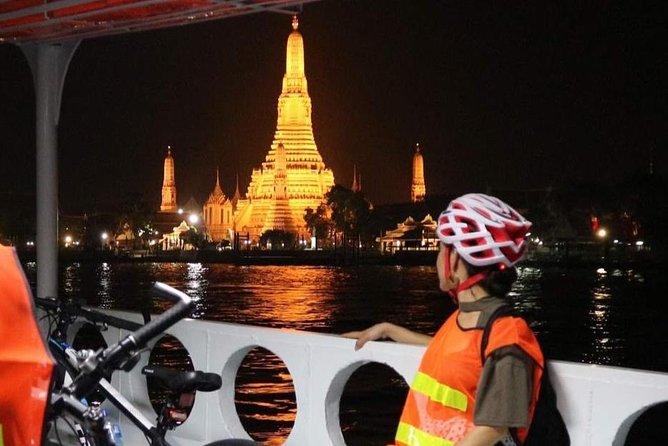 Bike Bangkok at Night with Thai Dinner - Wat Pho and temple stories on the far bank