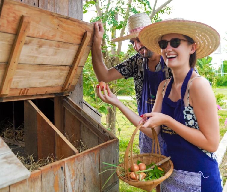 Chiang Mai: Authentic Cooking Class with Market & Farm Visit - Cooking Thai dishes at your own station
