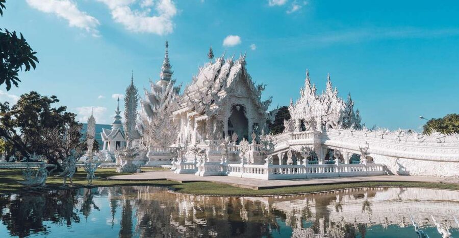 Chiang Mai: Chiang Rai Temples & Black House Discovery Tour - Wat Rong Khun brings the visual drama