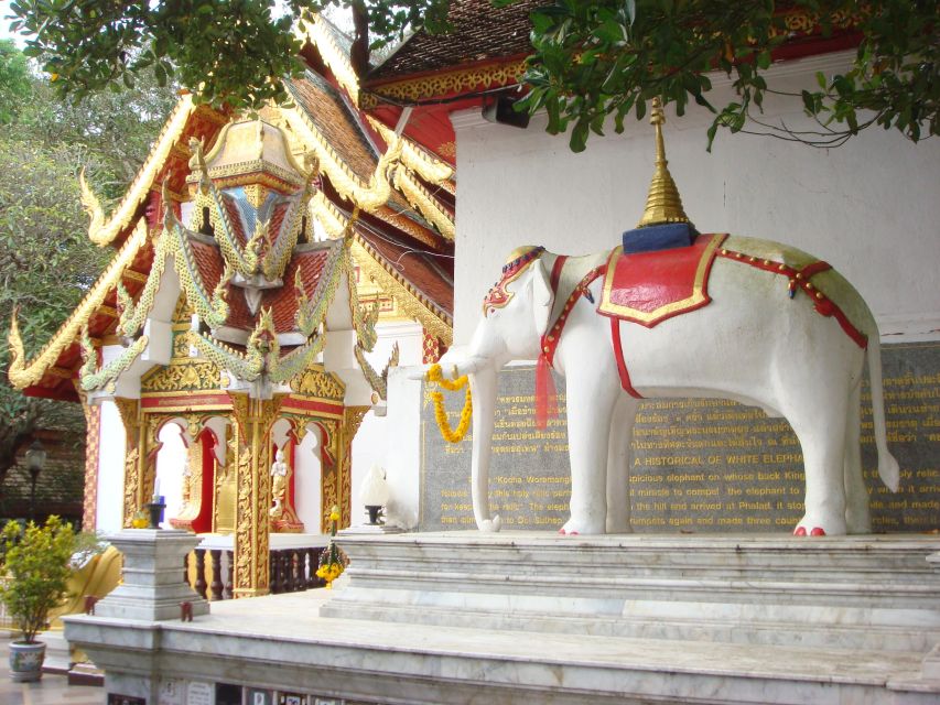 Chiang Mai: Doi Suthep and Hmong Village Half-Day Tour - The Hmong village and local traditions