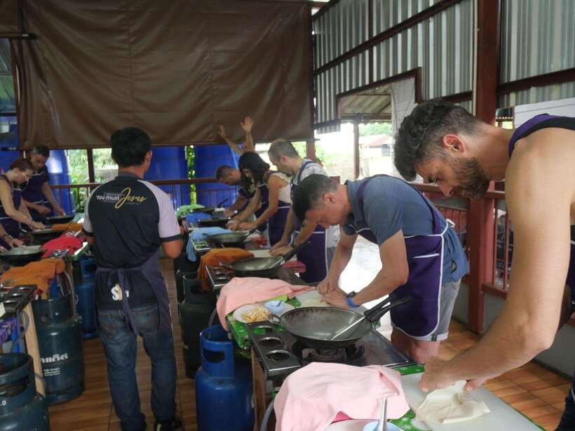 Chiang Mai: Half Day Cooking Class at Organic Farm - Learning at an individual cooking station