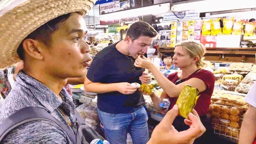 Chiang Mai: History & Mouth Watering Food Tour - Walking from restaurants to the local market