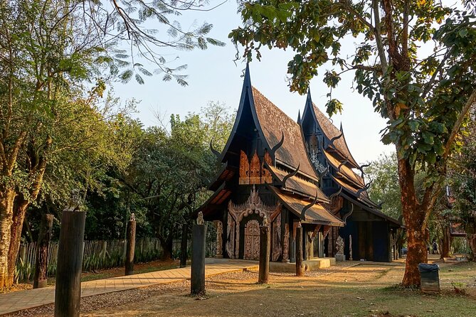 Chiang Rai Famed Temples and Golden Triangle Tour from Chiang Mai - Baan Dam, the Black House, changes the mood