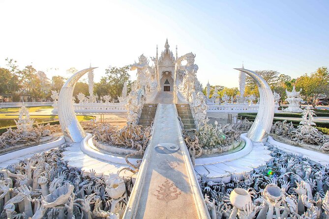 Chiang Rai Full Day Tour with Boat Trip and Longneck Village - Wat Rong Khun and the strange beauty of the White Temple