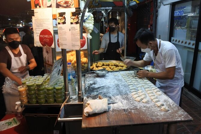 Chinatown Street Food Night Tour by Tuk Tuk in Bangkok - Wat Ratchanatdaram and the Illuminated Grand Palace