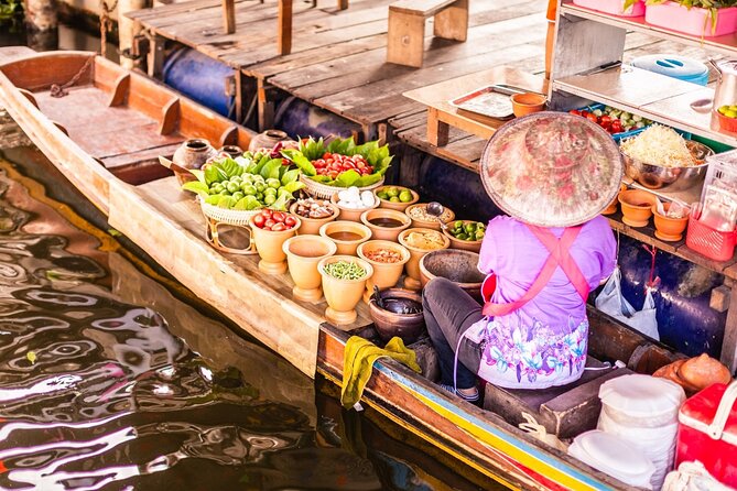 Damnoen Saduak Floating Market and Maeklong Railway Market Tour - Seeing Maeklong Railway Market close up