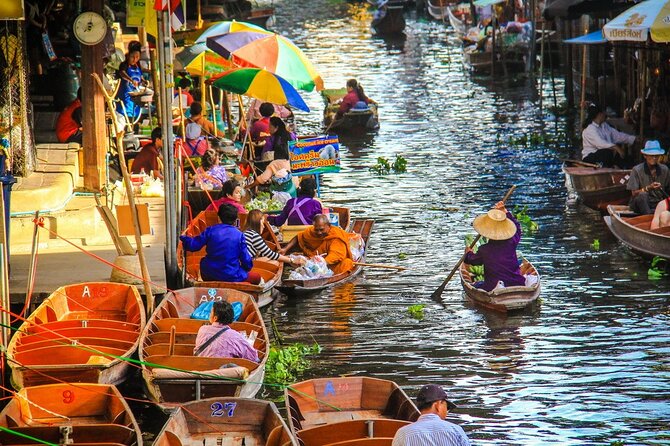 Damnoen Saduak Floating Market & Maeklong Railway Market Tour From Bangkok - The train ride adds more than a quick photo