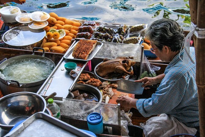 Damnoen Saduak Floating Market & Maeklong Railway Market Tour From Bangkok - Cancellation and weather terms