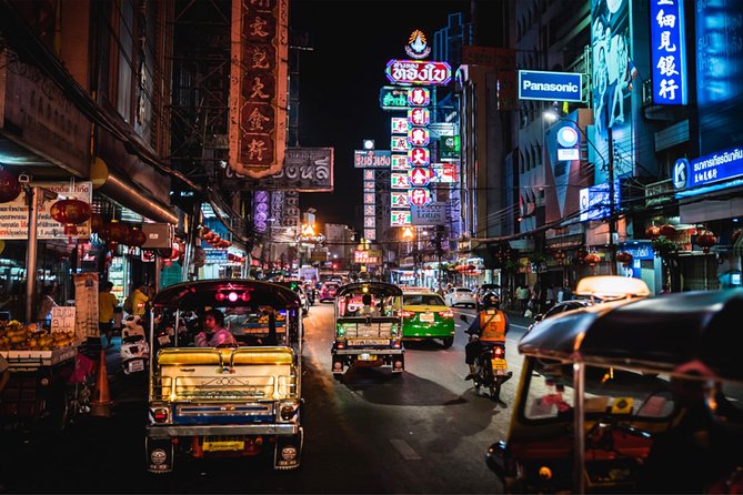 Discover Bangkok at Night 5-Hour Bike Tour with dinner - Crossing the Chao Phraya River by local ferry