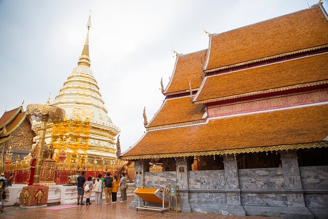 Doi Suthep and Wat Pha Lat Sunrise Tour (Small Group Only) - Climbing the 309 steps at Doi Suthep