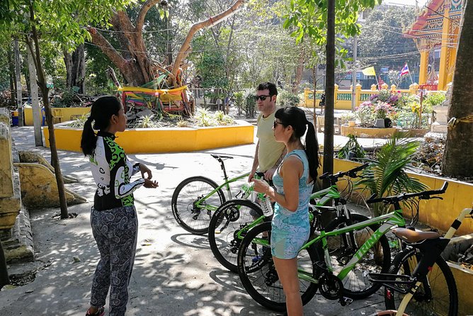 Explore Bangkok by Bike & Boat with Lunch - What the guide adds to the ride
