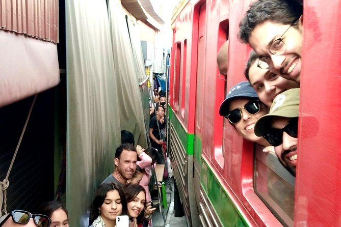 Floating & Railway Market and Coconut Farm Tour [Optional Luxury] - Mae Klong Railway Market and the famous disappearing stalls