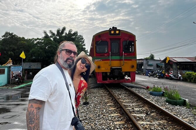 Floating & Railway Markets Tour - Riding the local train to Mae Klong