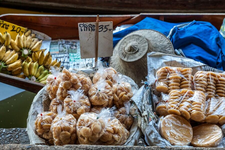 From Bangkok: Damnoen Saduak Floating Market Guided Tour - From Bangkok to Ratchaburi in an air-conditioned van