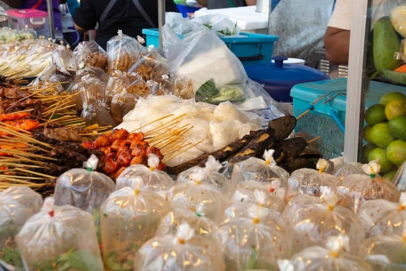 From Bangkok: Don Wai Market, Wat Samphran & Lotus Café Tour - Transport makes the route easier