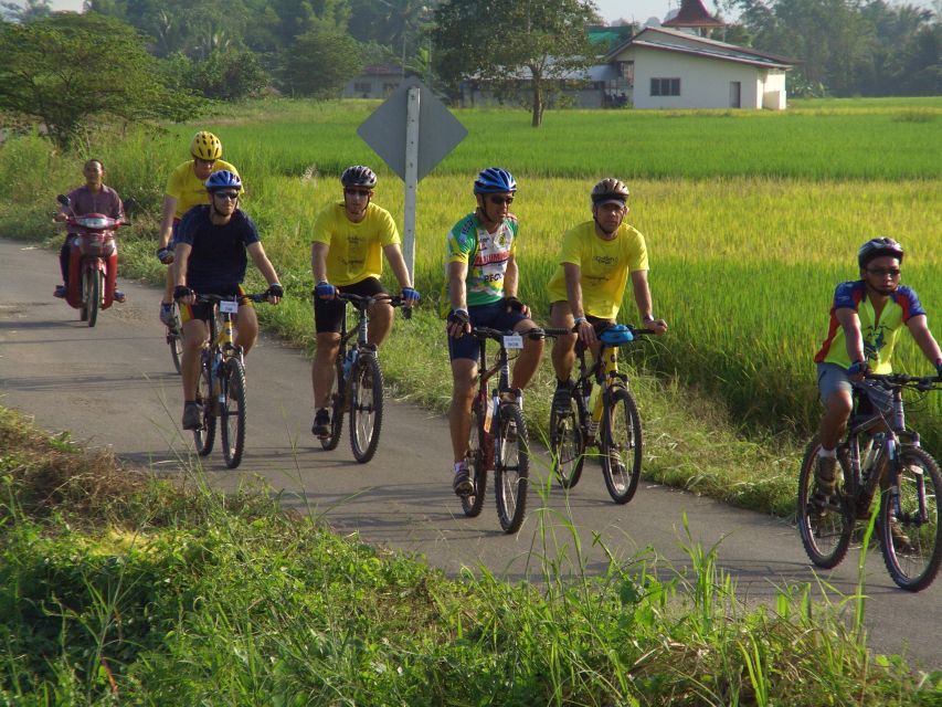 From Chiang Mai: Mae Taeng Valley and Waterfalls Cycle Tour - Cooling off at Buatong Sticky Waterfalls