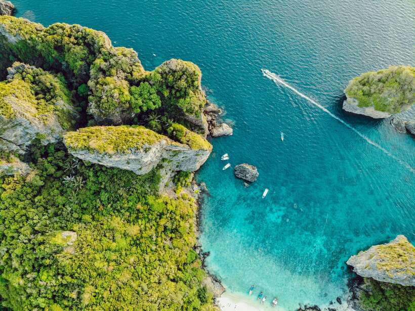 From Phi Phi: Full Day by Longtail Boat with Sunset - Pileh Lagoon gives you the best swim