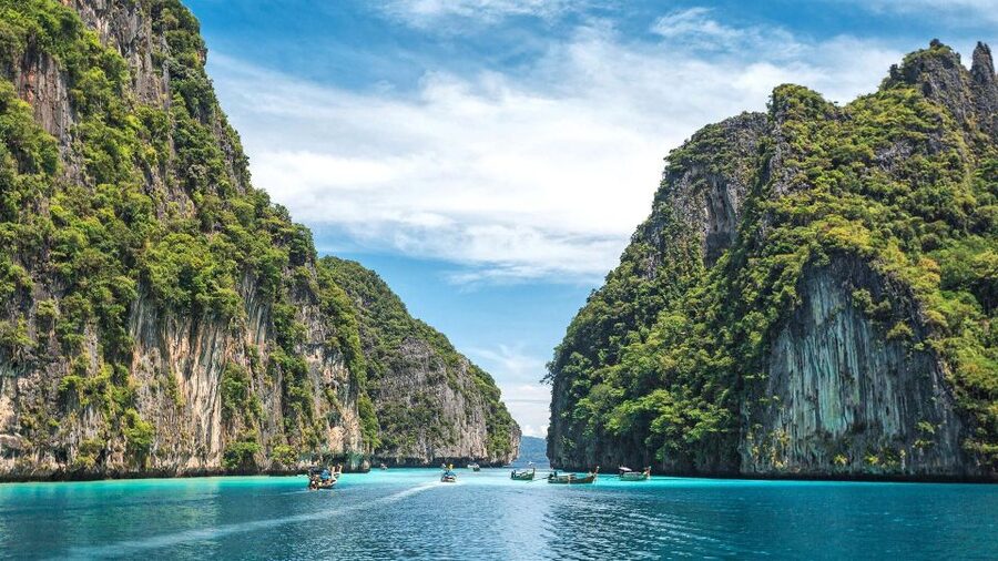 From Phi Phi: Full Day Snorkeling Trip by Longtail Boat - Sunset and glowing plankton after dark