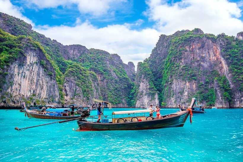 From Phi Phi islands: Phi Phi, Maya Area by longtail Boat - Maya Bay and the price of fame
