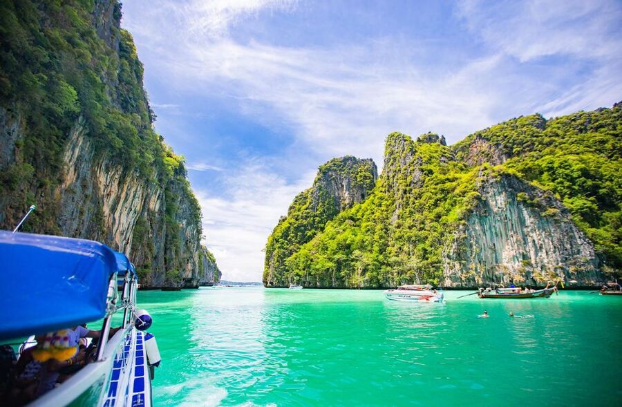 From Phi Phi: Sunrise Maya Bay, Pileh Lagoon Speedboat Tour - Loh Samah Bay adds another scenic passage