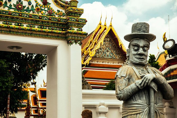 Full Day Bangkok PRIVATE City Tour With Locals - Wat Trimit & Wat Pho tickets - Seeing canal life from the boat