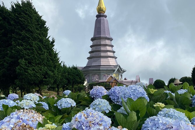 Full-Day Doi Inthanon National Park Tour with Trek and Pagodas - Wachirathan Waterfall closes the sightseeing