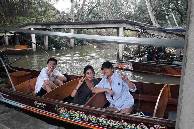 Full-Day Floating Market and Maeklong Railway Market Private Tour from Bangkok - Wat Phet Samuth Woravihan beside the river
