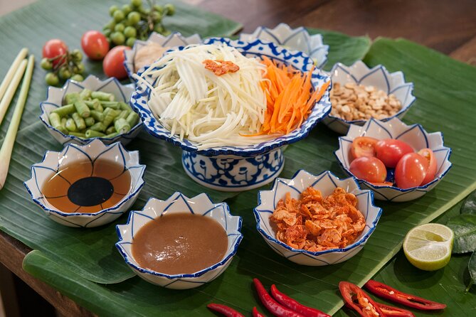 Hands-on Thai Cooking Class & Market Tour in Sukhumvit - Mango sticky rice and fruit carving