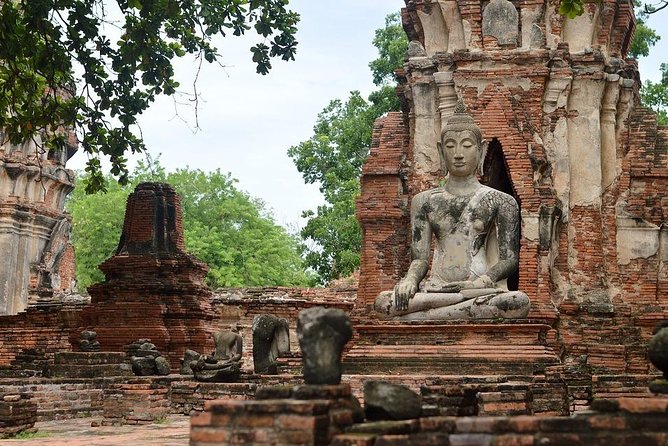 Historical City of Ayutthaya - Unesco Full Day Tour From Bangkok - Wat Mahathat and the famous temple imagery