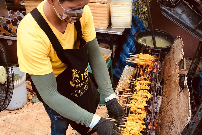 Incredible Bangkok Food Tour - The first plates: pork leg, satay, and street favorites