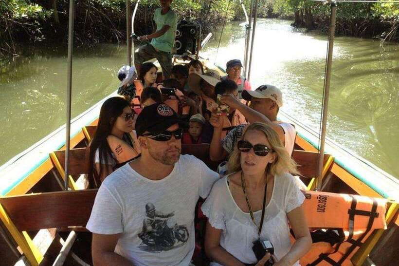 Khaolak: Phang Nga Bay, Tapu Island, and Panyi Village Tour - Sea caves and hidden lagoons when the tide allows