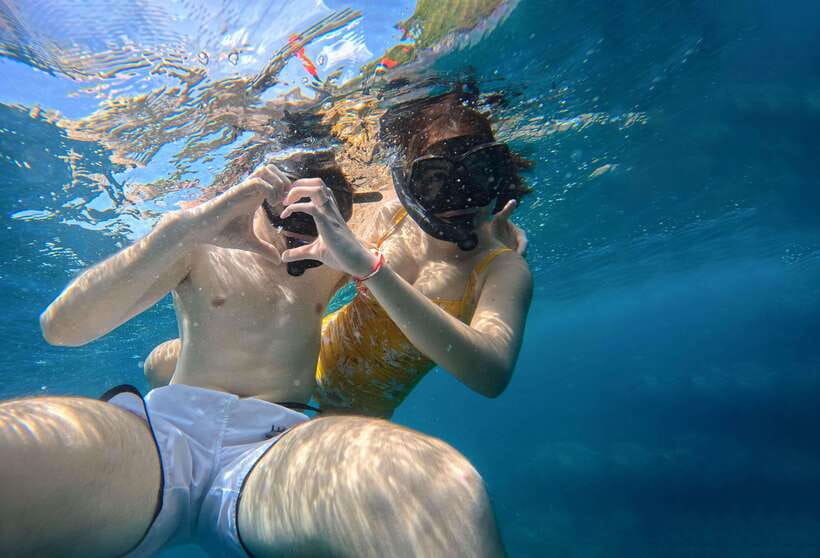 Ko Tao: Late Riser Snorkeling Tour with Lunch and Photos - Thai lunch and shallow water at Mango Bay