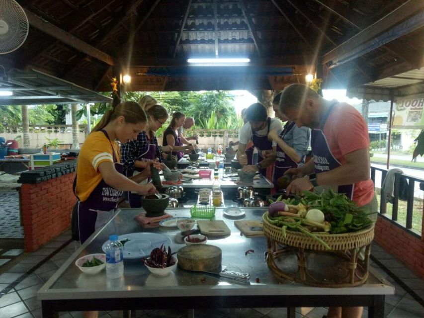 Krabi: Cooking Class at Thai Charm Cooking School with Meal - Pounding curry paste, the most memorable lesson